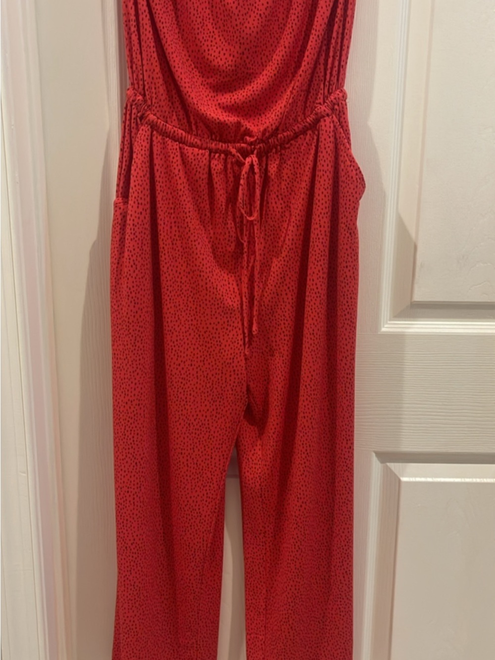 Express Sleeveless Red Drawstring Jumpsuit with Subtle Dot Print